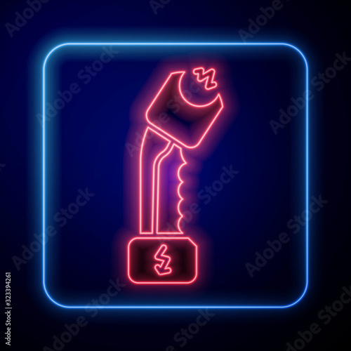 Glowing neon Police electric shocker icon isolated on blue background. Shocker for protection. Taser is an electric weapon. Vector Illustration