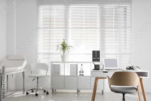 Tableau sur toile Doctor's office interior with modern workplace in clinic