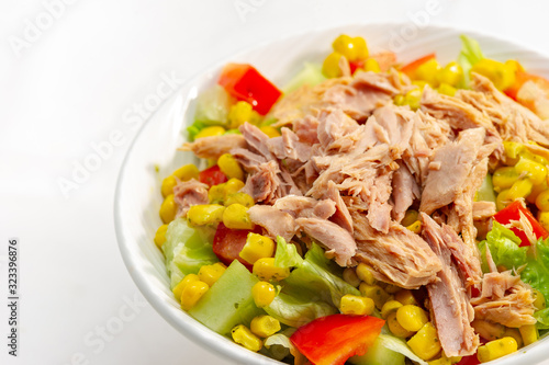 Tuna and corn salad, with cucumber tomato and lettuce.