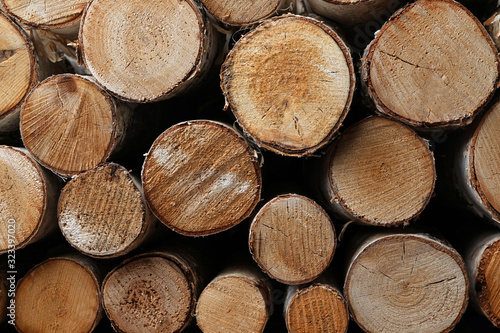 Stack of cut firewood as background  closeup view