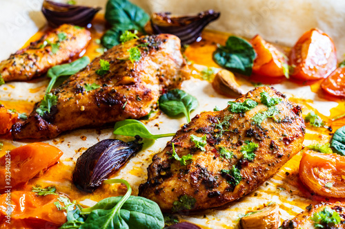 Sheet-pan barbecue chicken breasts with roast vegetables