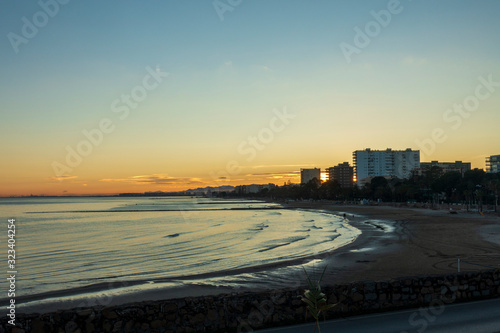 Sunset between the buildings on the coast of Benicassim, Costa Azahar