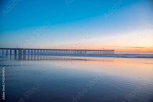 sunset over the wooden pier of Pismo Beach California © DD25