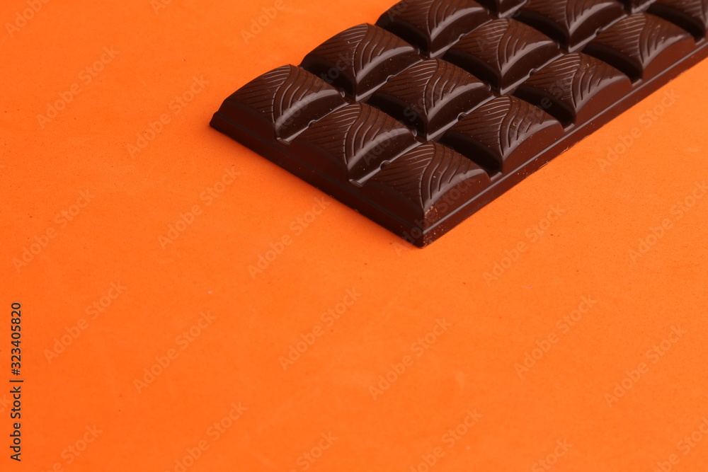 milk chocolate tablet in color background