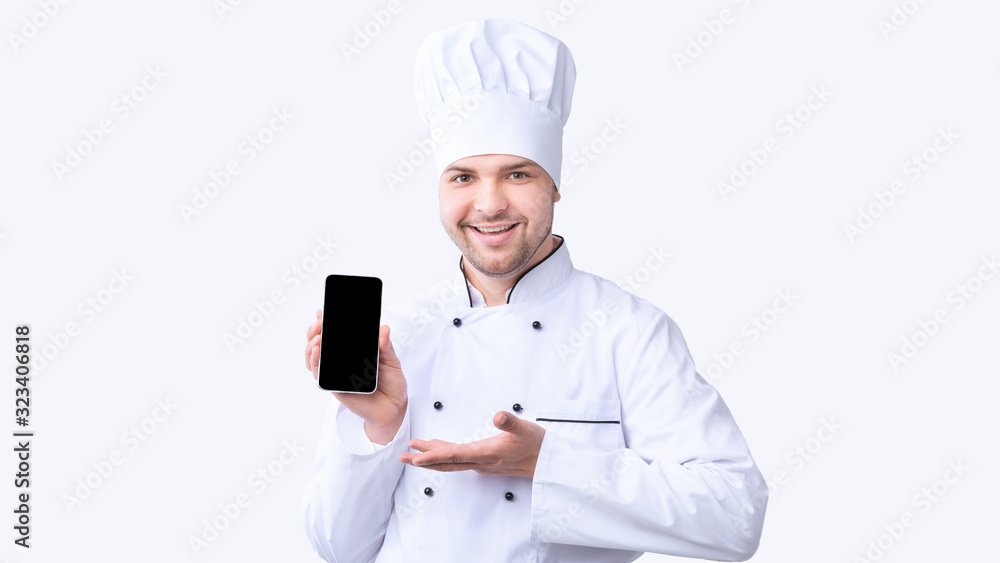Restaurant Chef Showing Cellphone With Empty Screen On White Background Restaurant Chef Showing Cellphone With Empty Screen On White Background