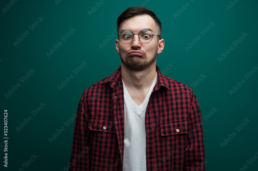 Portrait of a funny young interested man Portrait of a funny young interested man