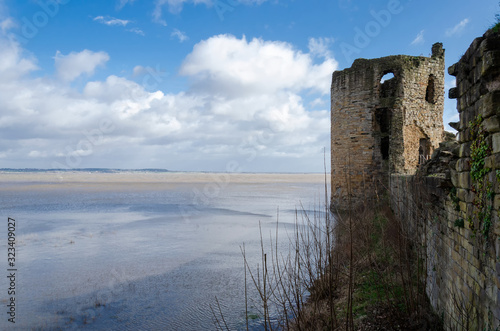 Flint Castle seen on the day of an unusually high spring tide. photo