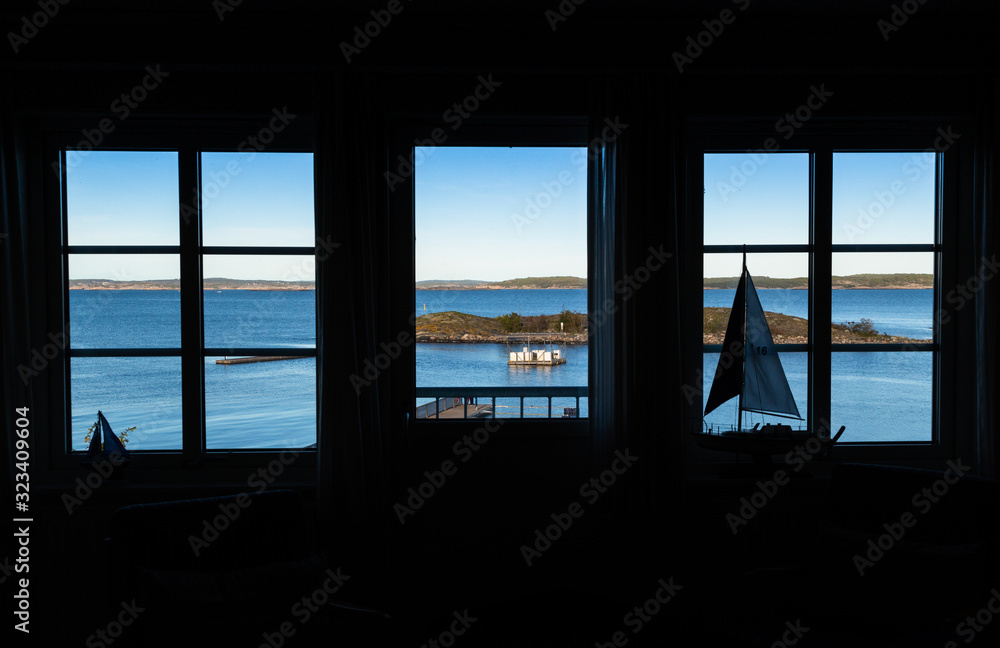 Fototapeta premium A view from window over a harbor. Perfect view. House of dream 