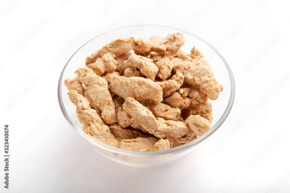 Organic vegetal soy meat portion in glass bowl Organic vegetal soy meat portion in glass bowl