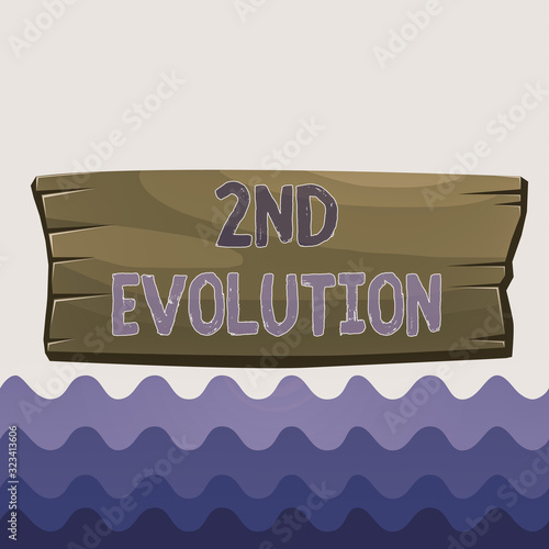 Conceptual hand writing showing 2Nd Evolution. Concept meaning change in the heritable features of biological populations Wooden board rectangle shaped wood attached color background