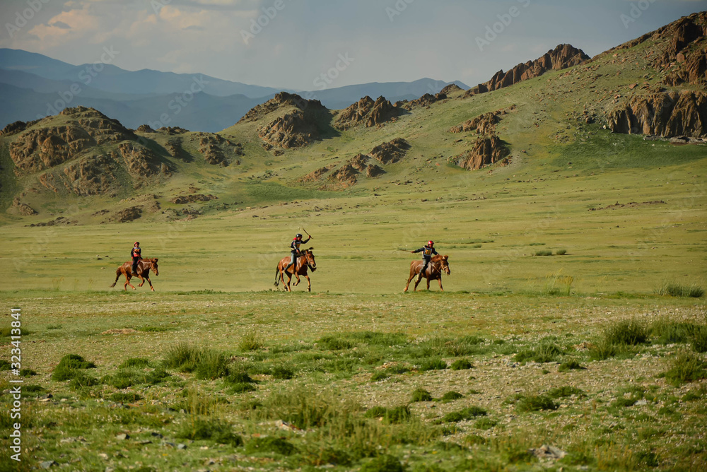 Mongolian horse race during Naadam festival in western Mongolia. Naadam is inscribed on the List of the Intangible Cultural Heritage of Humanity.