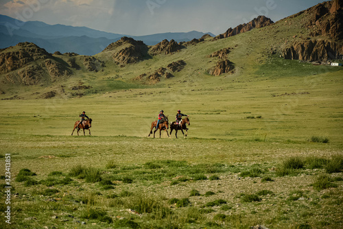 Mongolian horse race during Naadam festival in western Mongolia. Naadam is inscribed on the List of the Intangible Cultural Heritage of Humanity.