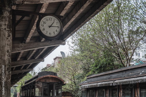 old clock in railway station platform