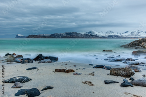 beautiful view over fjord. Sommaroy, Norway. Polar night. long shutter speed