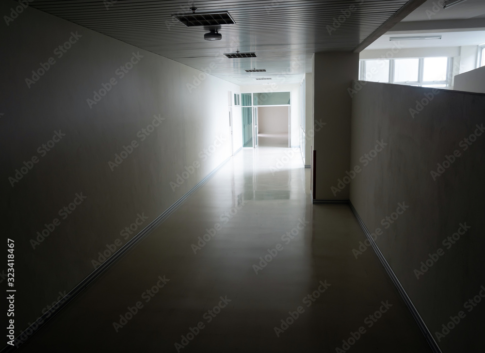 Light at the exit of the corridor in the building Light at the exit of the corridor in the building