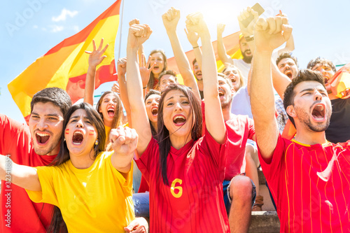 Spanish supporters celebrating and cheering at stadium