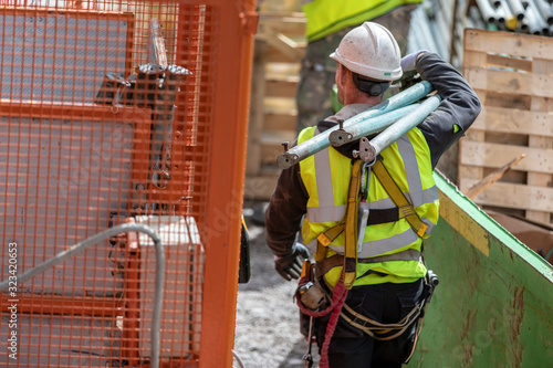 Carry the piece of scaffolding photo