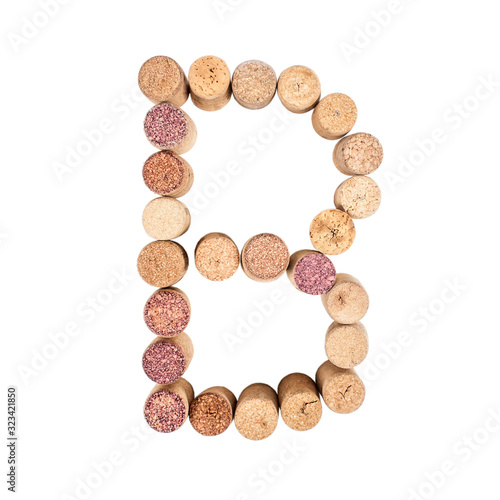 The letter "B" is made of wine corks. Isolated on white background