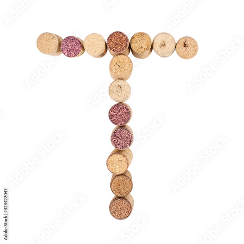 The letter "T" is made of wine corks. Isolated on white background