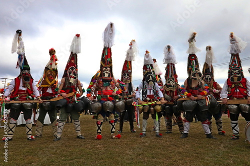 Elin Pelin, Bulgaria - February 15, 2020: Masquerade festival in Elin Pelin, Bulgaria. People with mask called Kukeri dance and perform to scare the evil spirits.