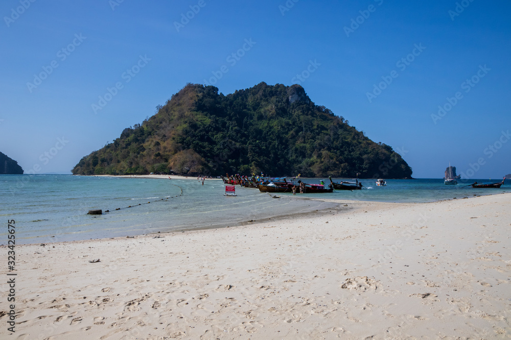 beach in Thailand with long tail boat