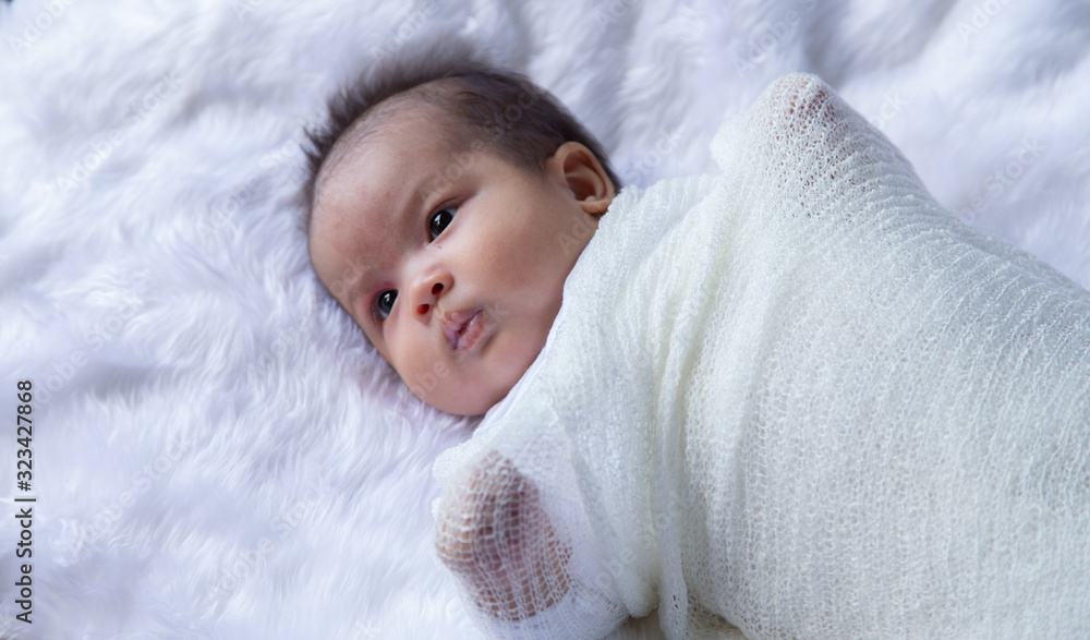 Asian newborn baby Adorable beautiful on a white cloth, concept: banner family parents love mother’s day, Asian newborn baby Adorable beautiful on a white cloth, concept: banner family parents love mother’s day,