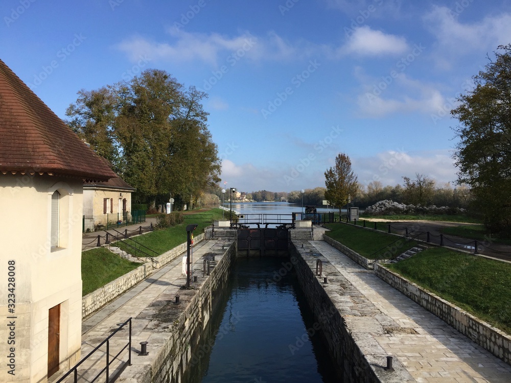 The Canal du Rhône au Rhin in the vicinity of Dole, France. This important waterway connects the Rhine to the Saône and the Rhône and thereby the North Sea and the Mediterranean.