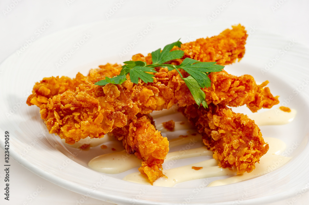 Breaded chicken drumsticks with Krispies and mustard sauce Breaded chicken drumsticks with Krispies and mustard sauce