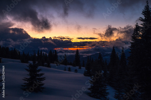 Winter landscape in the higest Carpahian mountains near Yaremche in the sunset