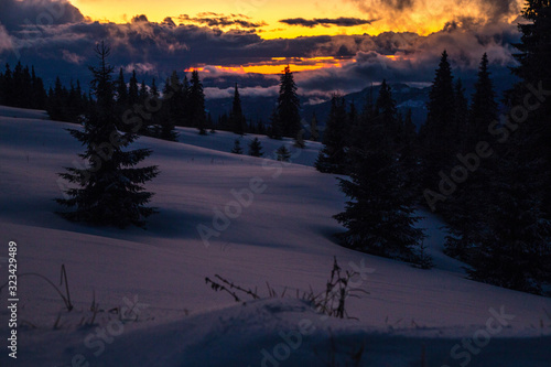 Winter landscape in the higest Carpahian mountains near Yaremche in the sunset