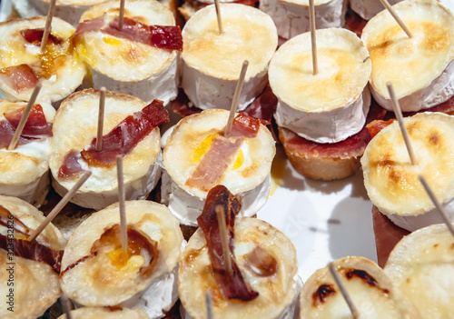 Traditional Spanish snacks called pinchos in San Sebastian city also called Donostia in Gipuzkoa region of Spain photo