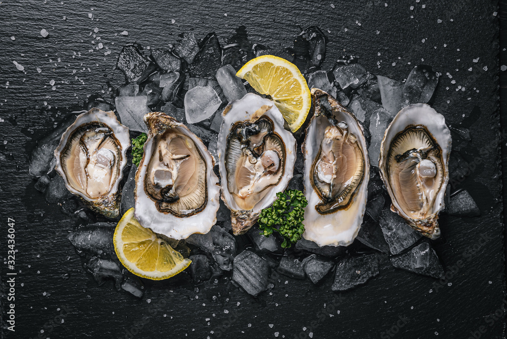 Fresh oysters with lemon ice and white wine.