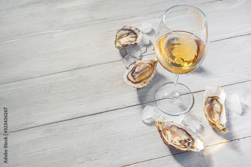 Fresh oysters with lemon ice and white wine. Fresh oysters with lemon ice and white wine.