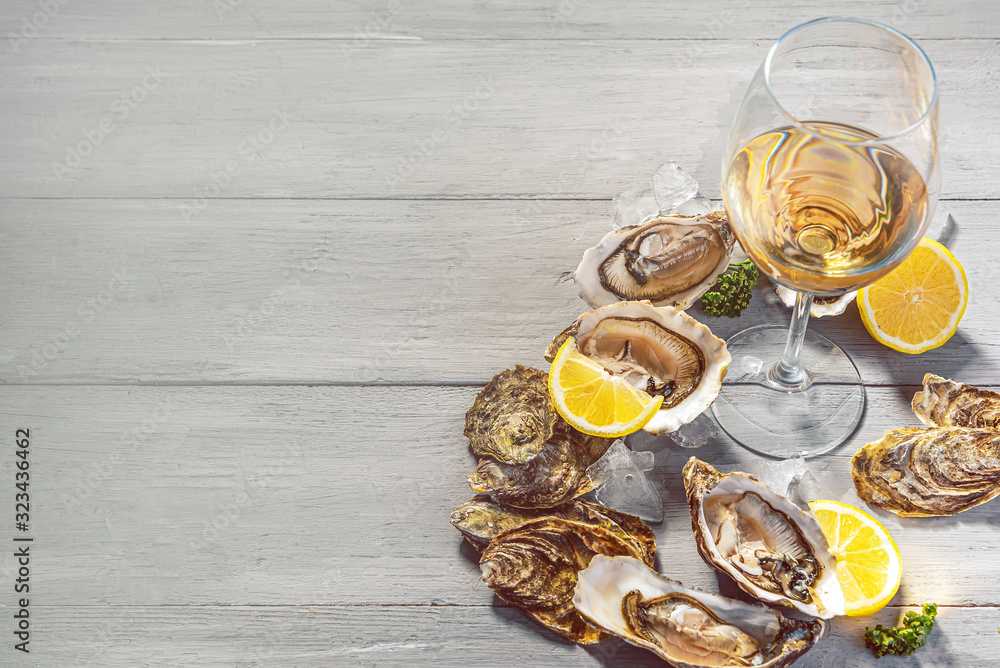 Fresh oysters with lemon ice and white wine. Fresh oysters with lemon ice and white wine.