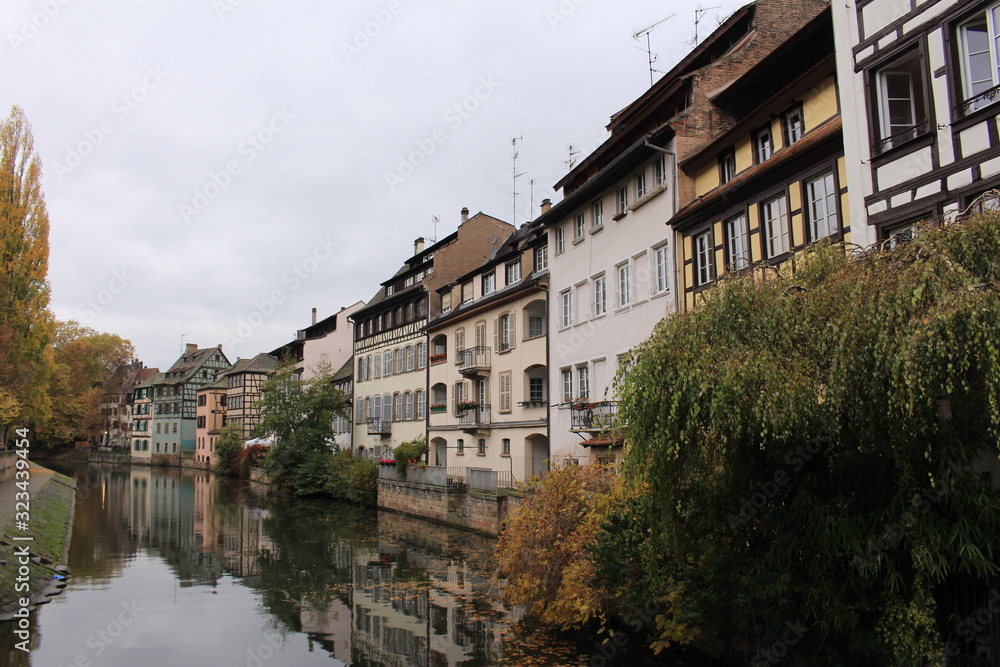 Traditional Alsatian timber framed houses on the banks of River Ill in Petite France, Strasbourg, France.
