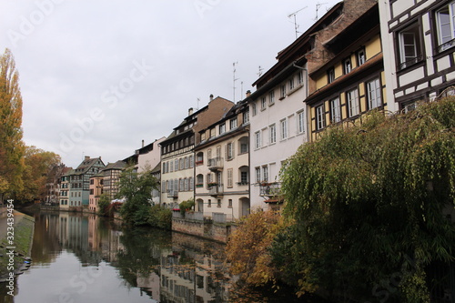Traditional Alsatian timber framed houses on the banks of River Ill in Petite France, Strasbourg, France. © RukiMedia