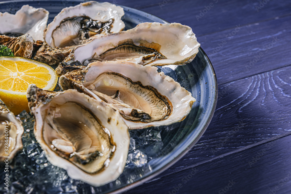 Fresh oysters with lemon ice and white wine. Fresh oysters with lemon ice and white wine.