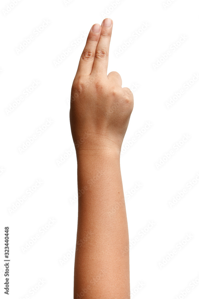 Boy Asian hand gestures isolated over the white background. Two Fingers Victory Sign. Gun symbol Boy Asian hand gestures isolated over the white background. Two Fingers Victory Sign. Gun symbol