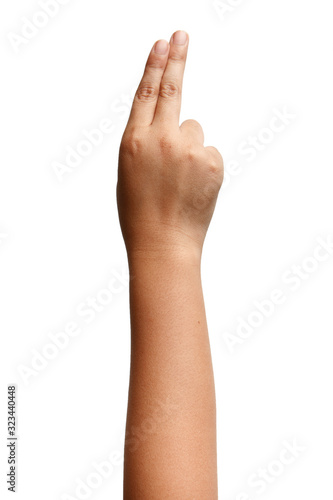 Boy Asian hand gestures isolated over the white background. Two Fingers Victory Sign. Gun symbol