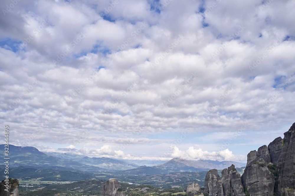 Fototapeta premium Legendary aerial drone view of ancient monasteries and breathtaking picturesque valley and landmark canyon of Meteora, Greece, Unesco