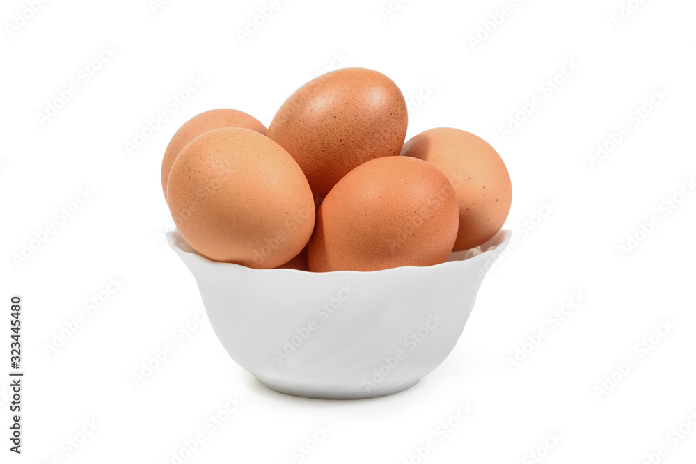 Brown eggs in white porcelan bowl isolated. Clipping path Brown eggs in white porcelan bowl isolated. Clipping path