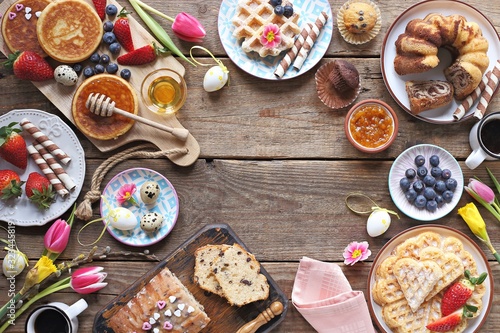 Wall Mural Easter festive dessert table with various of cakes,  pancakes, waffles and sweets