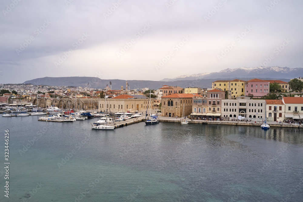 Panoramic drone aerial view from above of the city of Chania, Crete island, Greece. Landmarks of Greece, beautiful venetian town Chania in Crete island. Chania, Crete, Greece.