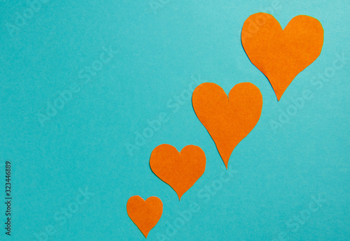 orange hearts on a blue background.