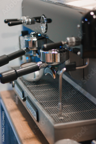  The process of making coffee. Barista and coffee machine