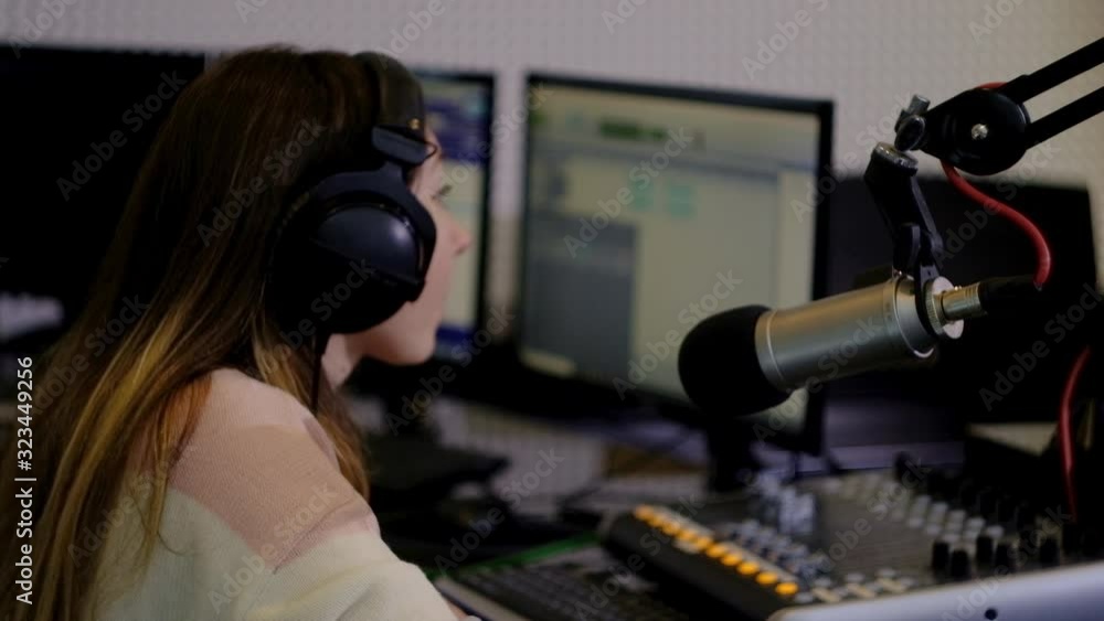 Girl radio host of a radio station. Girl radio host of a radio station.