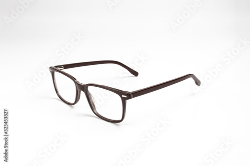 close up view of eyeglasses over white background