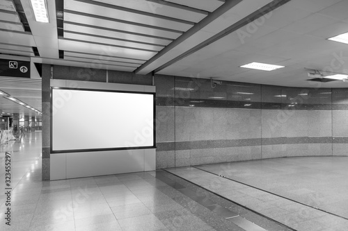 mock up full blank advertising billboard at underground trai,  background large LCD advertisement