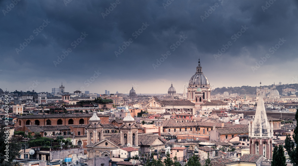 Rooftops of Rome under dramatic sky