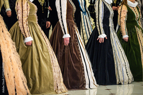 Canvas Print Details with the medieval/Renaissance dresses of women singing in a choir
